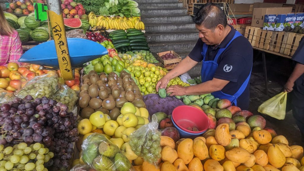 Fruit seller in Cuernavaca market, Mexico