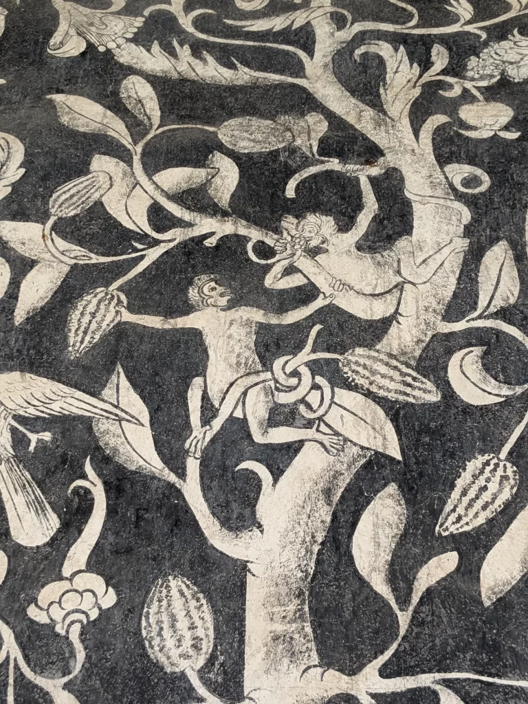 Close-up shot of a 16th Century fresco at the Divine Savior Parish and Augustinian Monastery in Malinalco, depicting monkeys in the forest