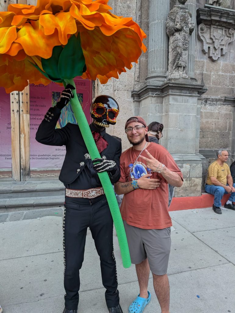 Student posing with a Catrin during the Day of the Dead Parade in Cuernavaca Mexico
