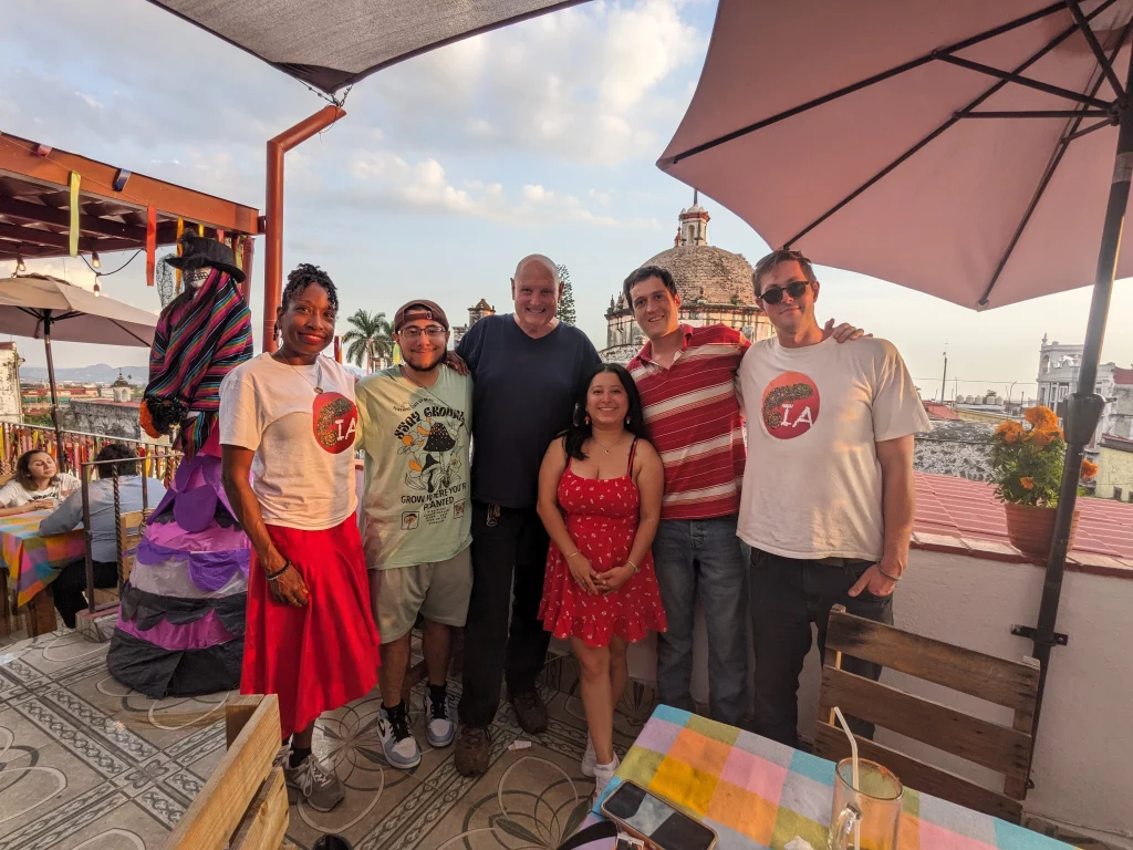 Iguana Abroad students on a restaurant terrace in the historical centre of Cuernavaca, Mexico, overlooking the cathedral