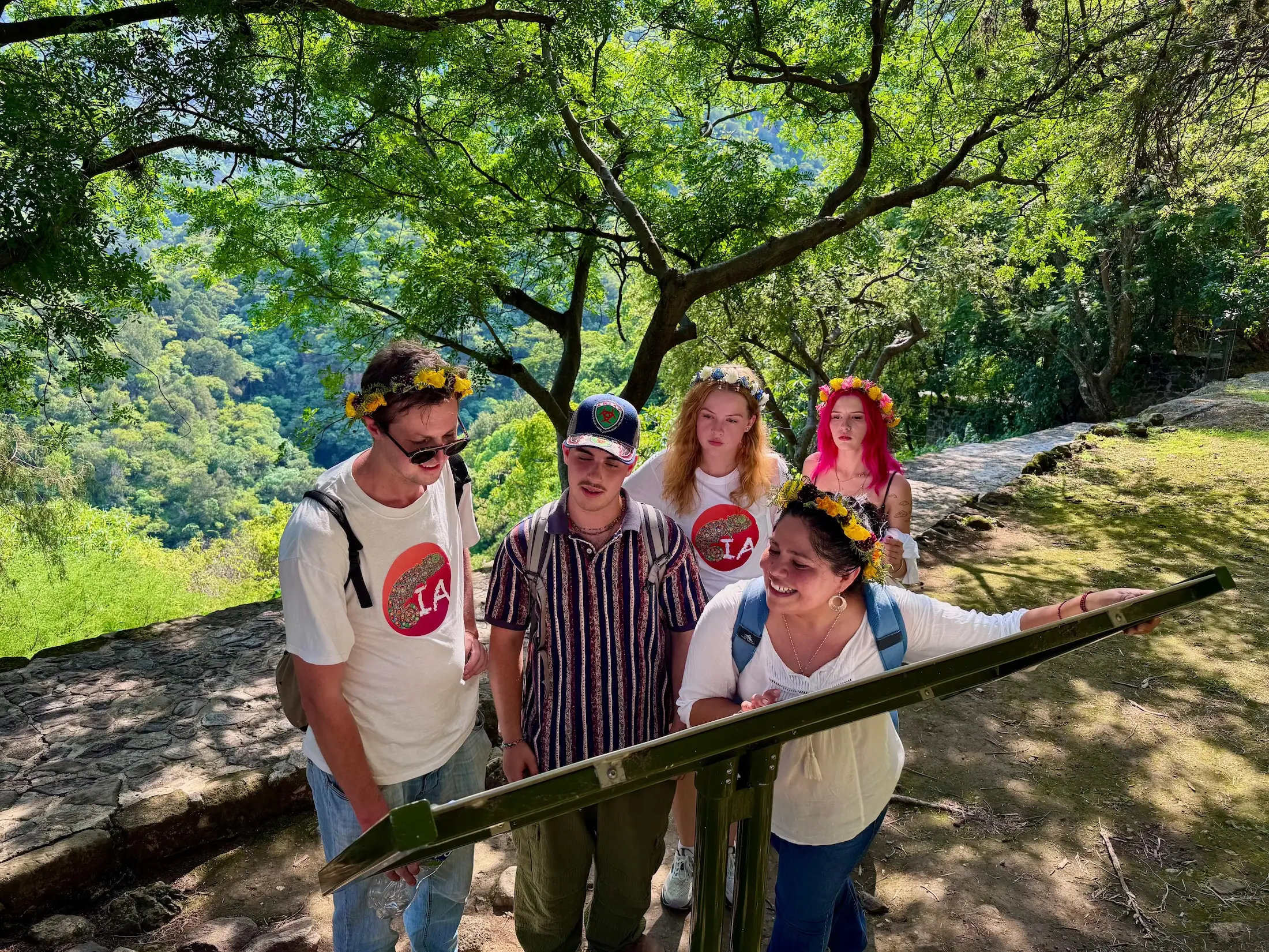 Students learning about history at the Cuauhcalli Pyramid in Malinalco Archeological Zone, Malinalco, Mexico