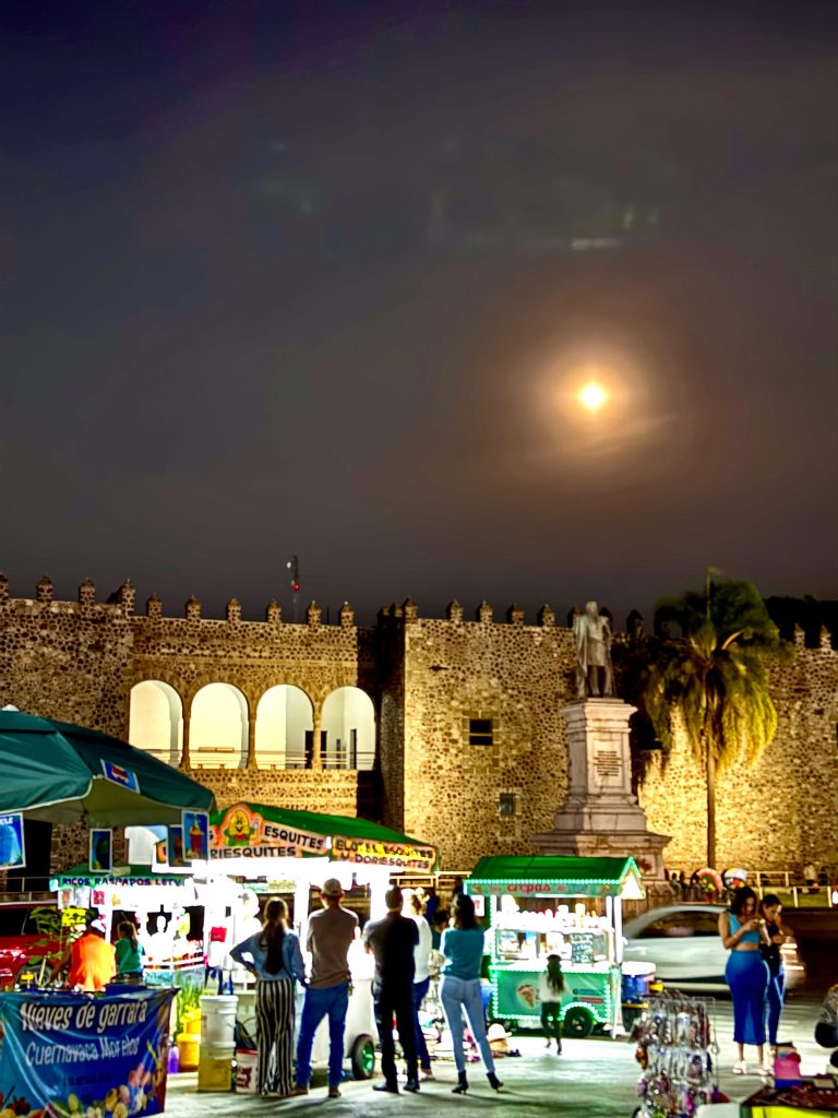 Venders in front of the Palacio de Cortes in Cuernavaca at night